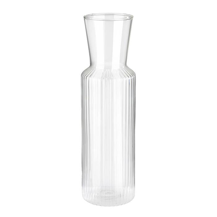 Klare, geriffelte Glasflasche, leer.