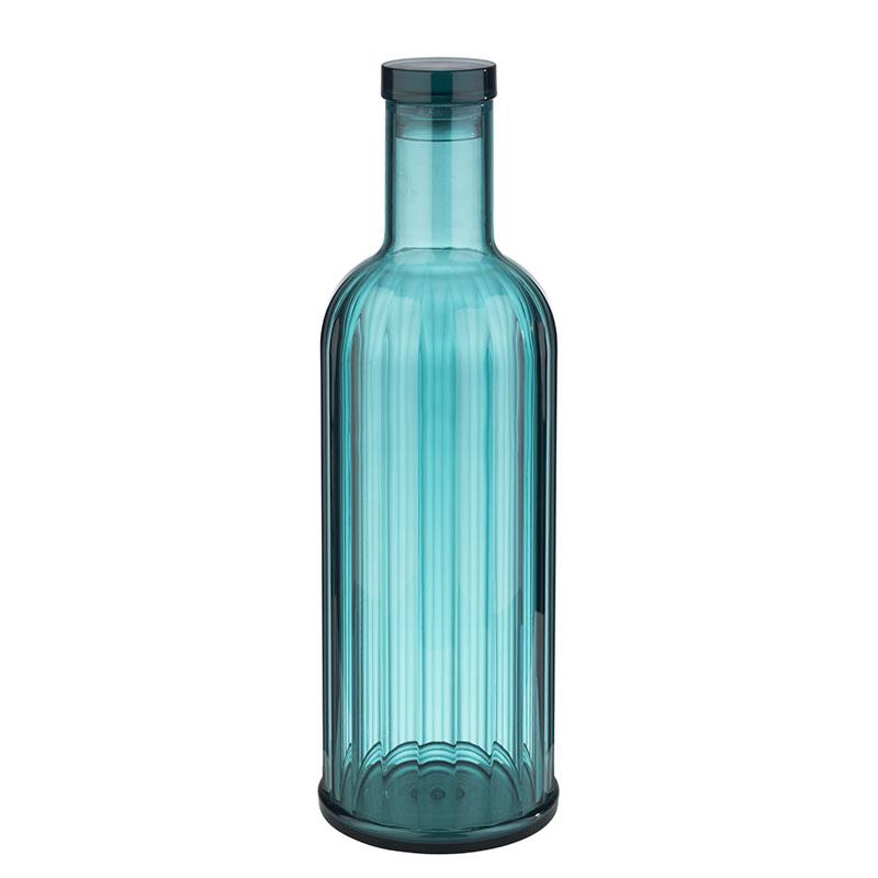 Blaue Glasflasche mit Deckel