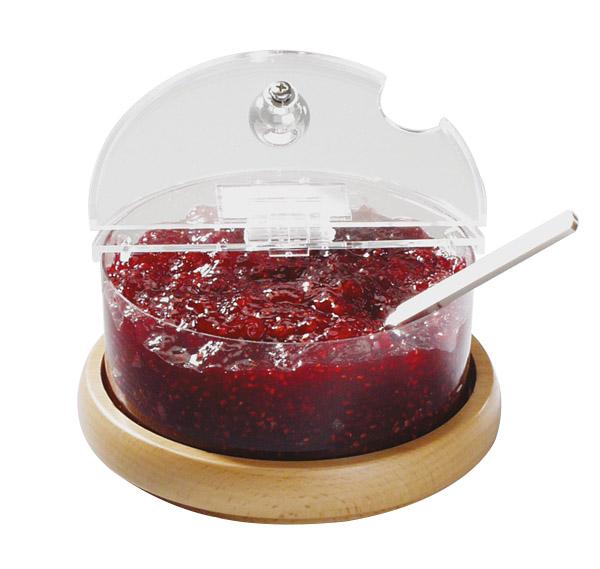 Marmeladenspender mit Holzuntersetzer.