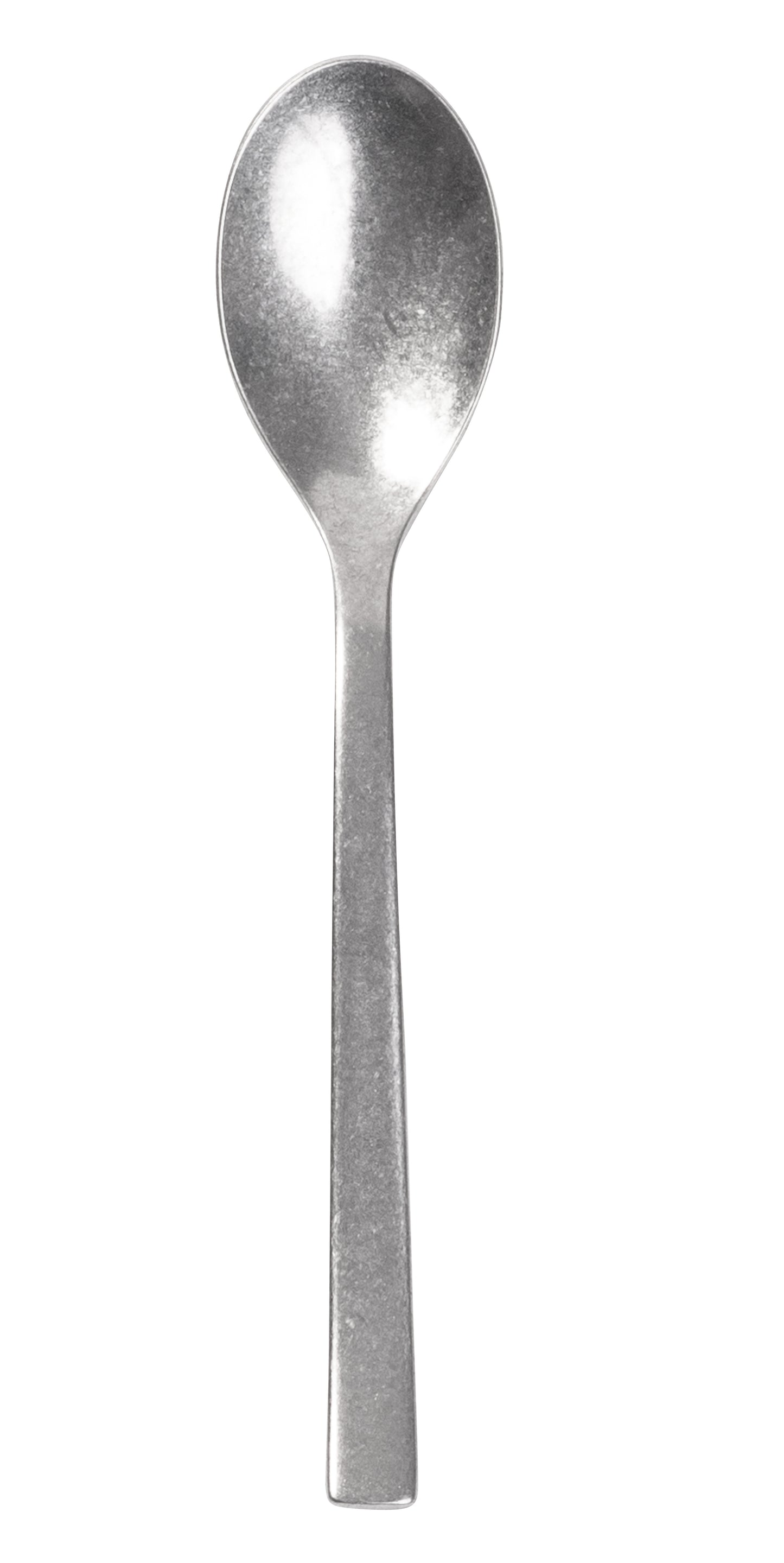 Metalllöffel auf weißem Hintergrund.