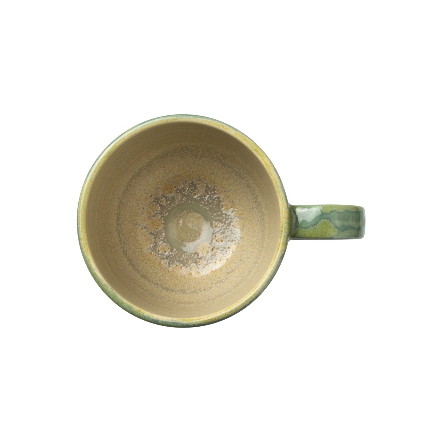 Grüne Tasse von oben fotografiert.