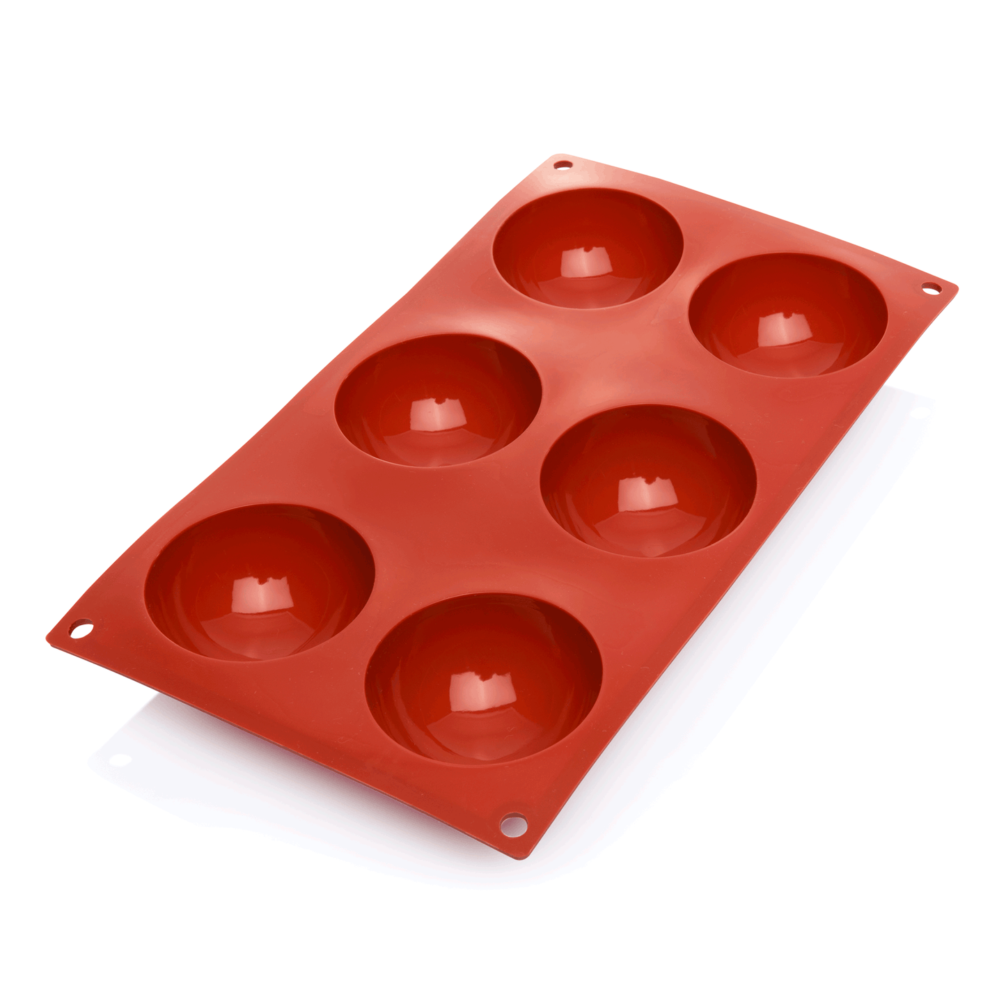 Rote Silikon-Backform mit Mulden.