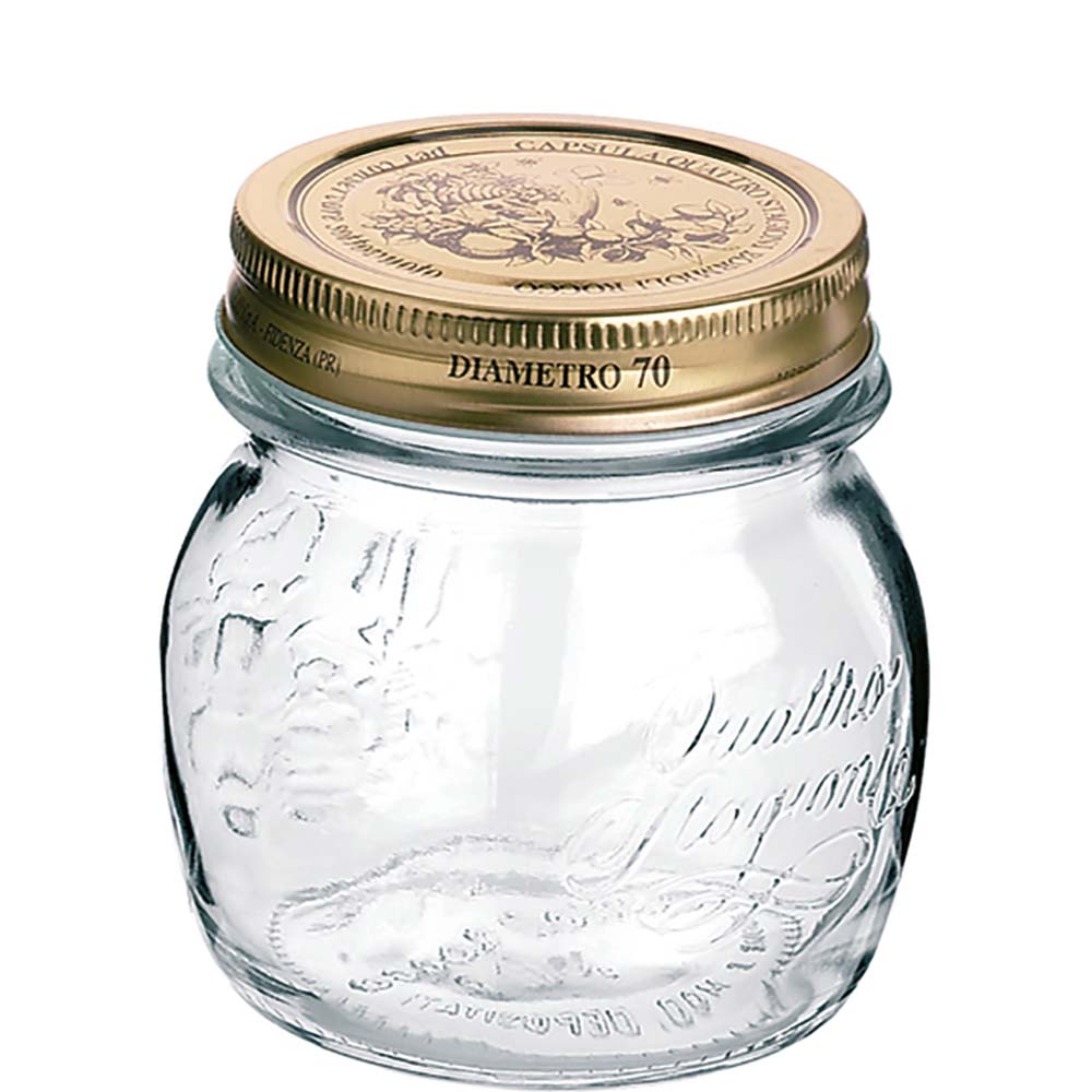 Leeres Glas mit goldenem Deckel.