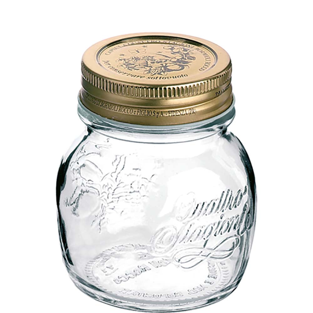 Leeres Glas mit goldenem Deckel.