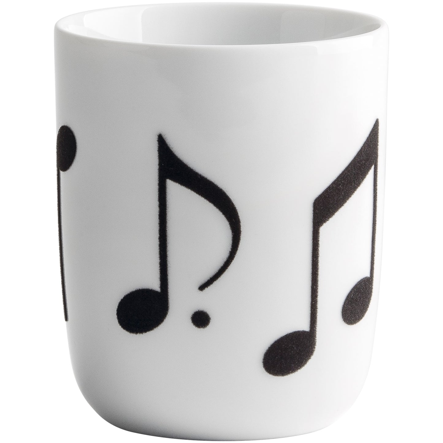 Weiße Tasse mit Notenmotiv.