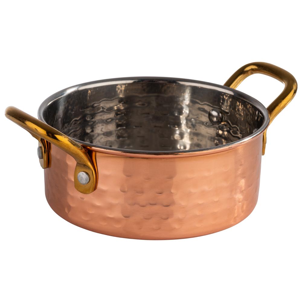 Kupfertopf mit goldenen Griffen.