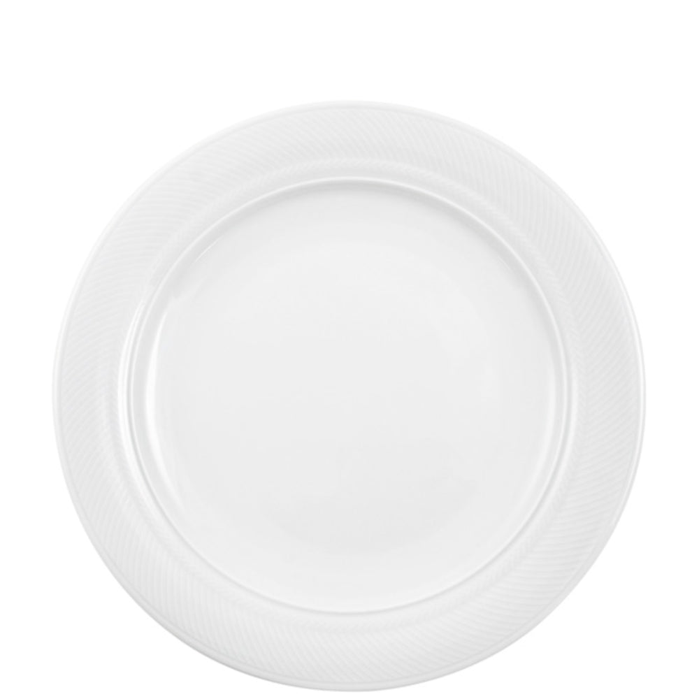 Weißer Porzellanteller mit Muster.