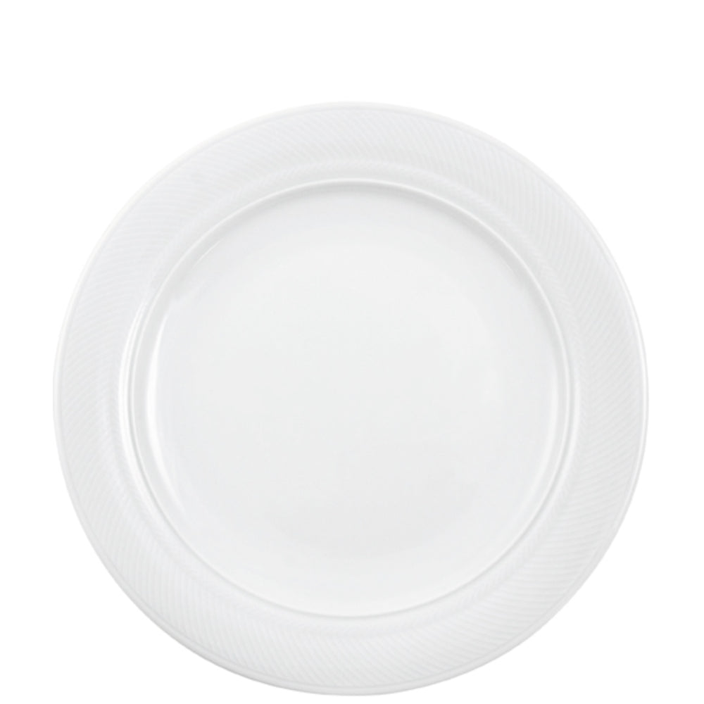 Weißer Porzellanteller mit Muster.