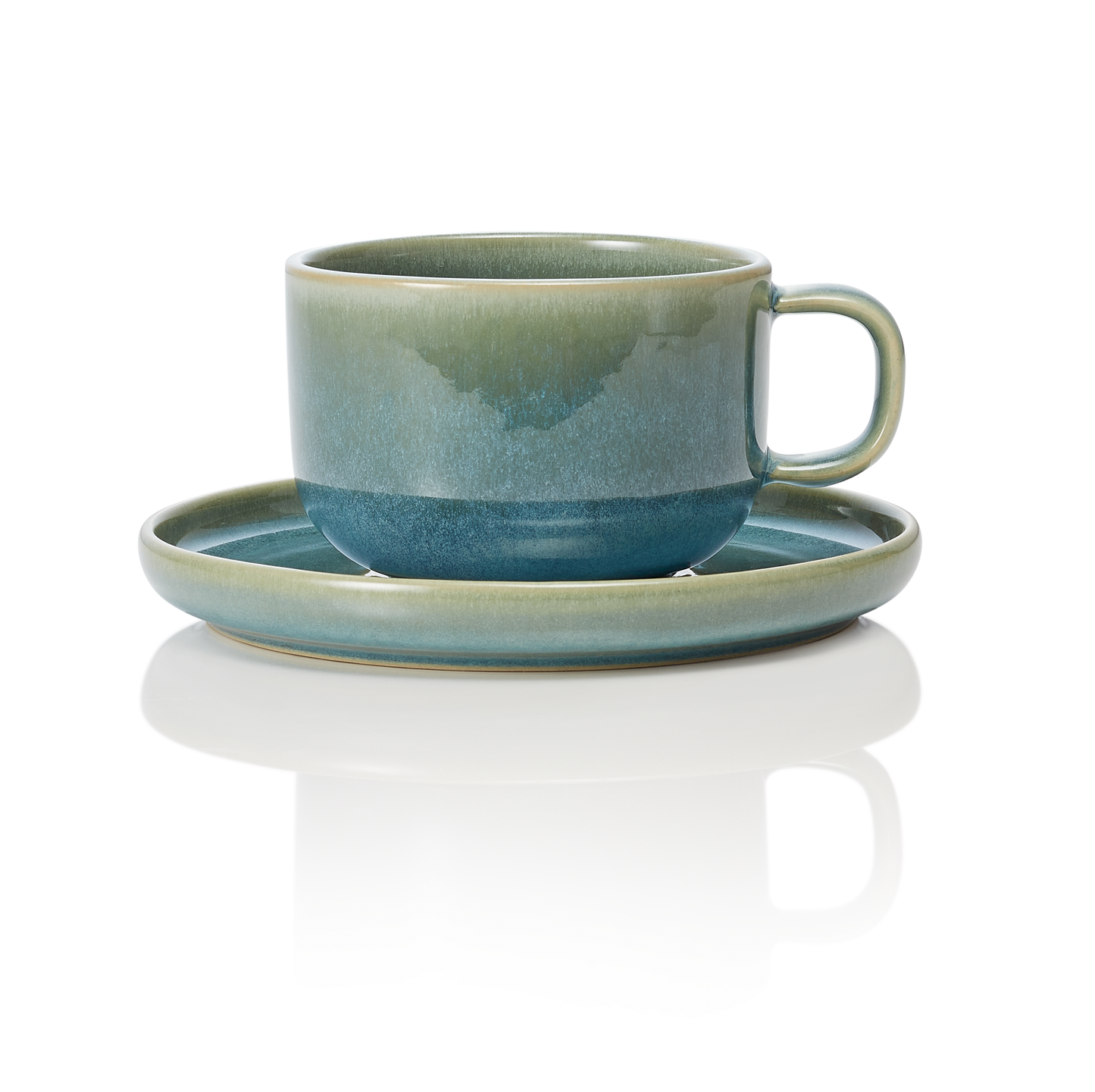 Grüne Tasse mit Untertasse.
