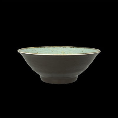 Keramikschüssel mit grünem Innenbereich.