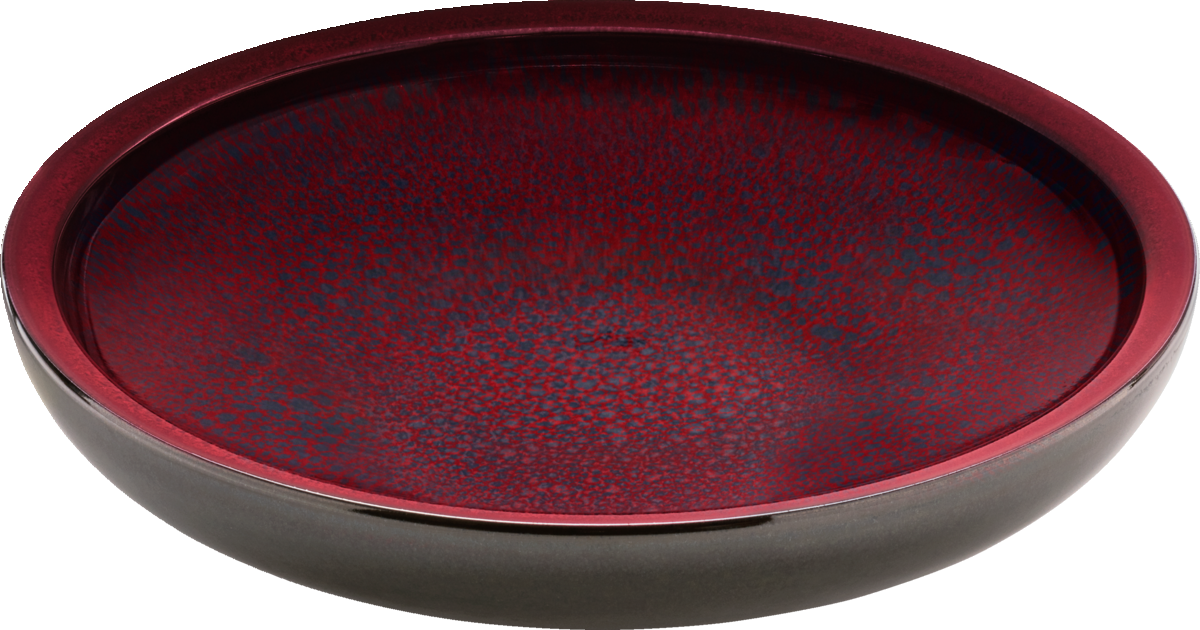 Rote Schale mit dunklem Rand.