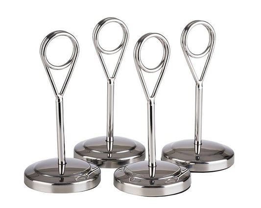 Vier silberne Tischkartenhalter.