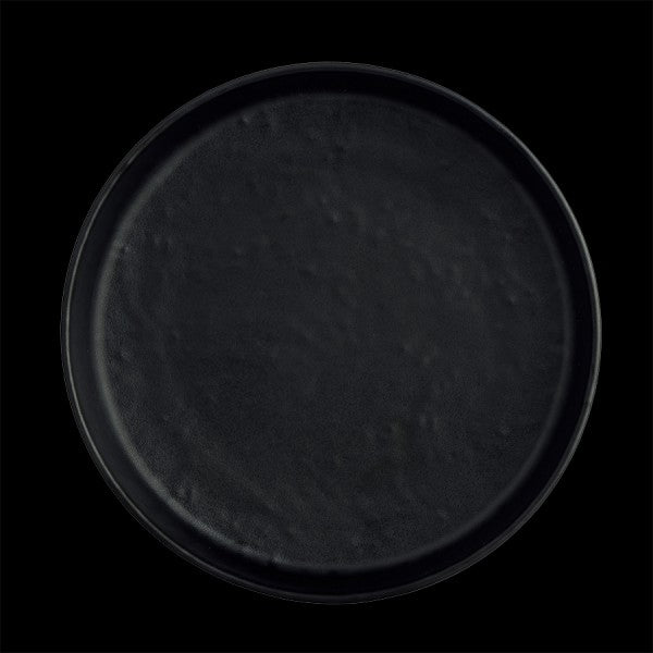 Schwarzes Tablett auf schwarzem Hintergrund.