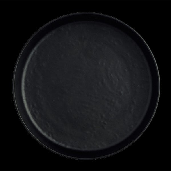 Schwarzes Tablett auf schwarzem Hintergrund.