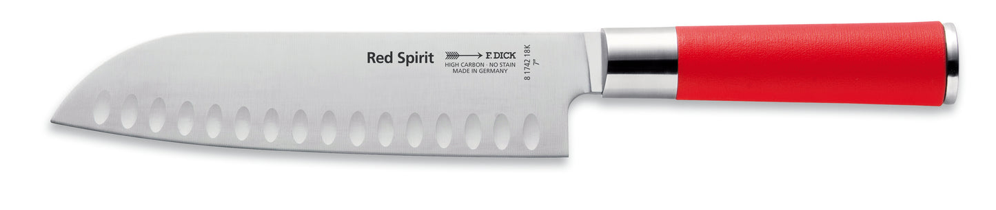 Rotes Küchenmesser mit Kullenschliff.