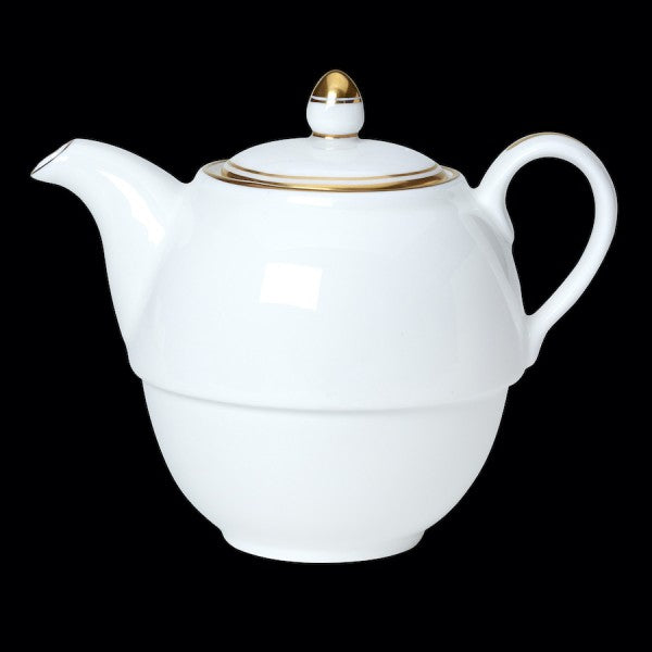 Weiße Teekanne mit Goldrand.