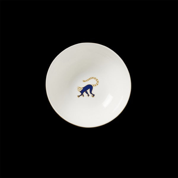 Weiße Schüssel mit Tiermotiv.