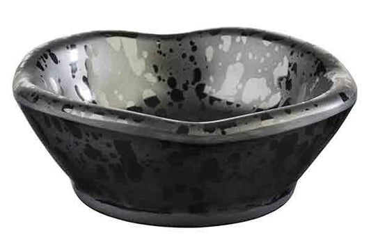 Schwarze Schale mit Sprenkelmuster.