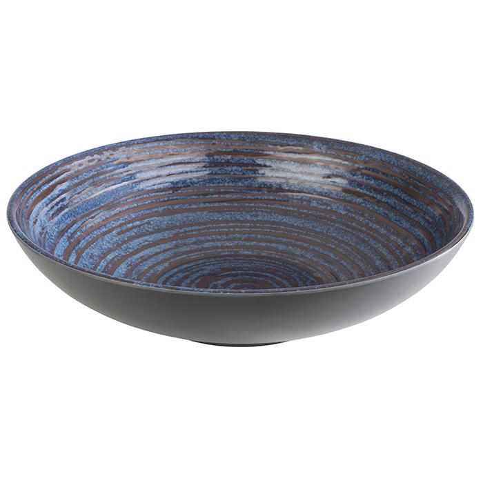 Blaue, gemusterte Servierschale aus Keramik.