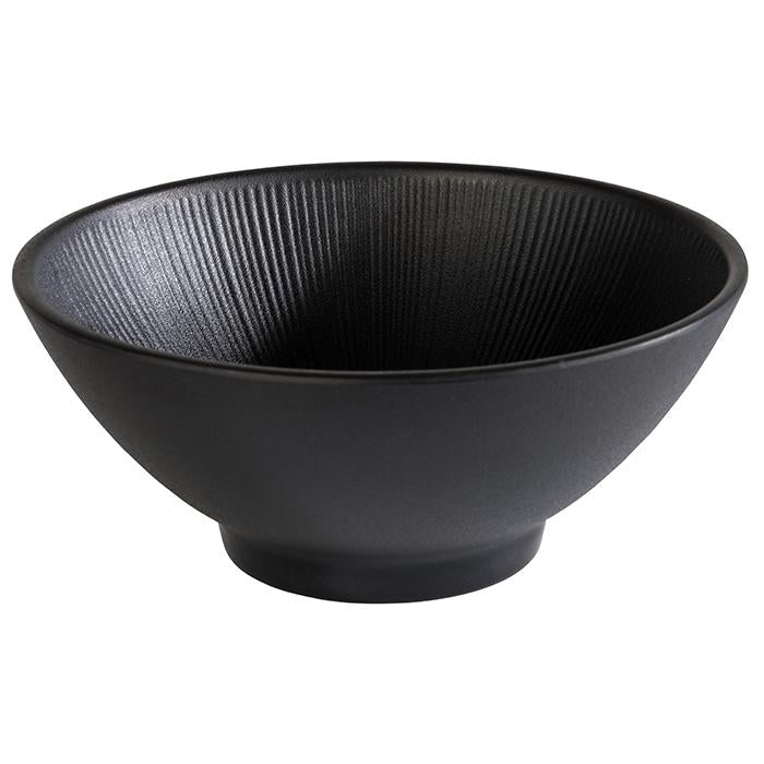Schwarze Schüssel mit Rillenstruktur.