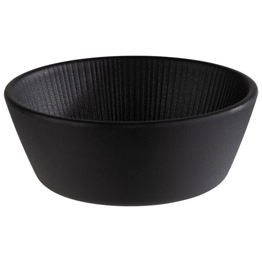 Schwarze Schale mit Rillenstruktur.