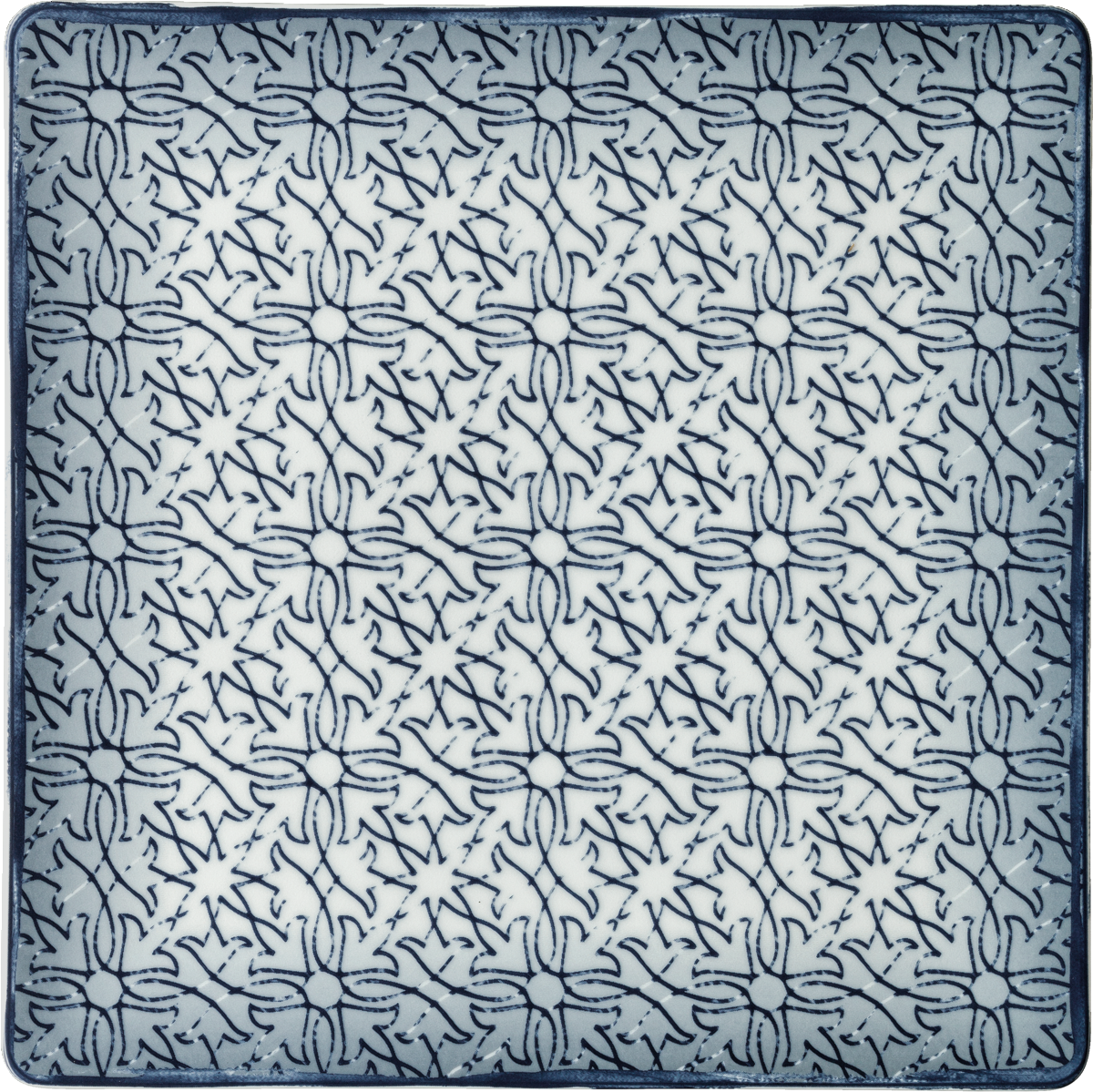Blau-weißes Teller mit Muster.