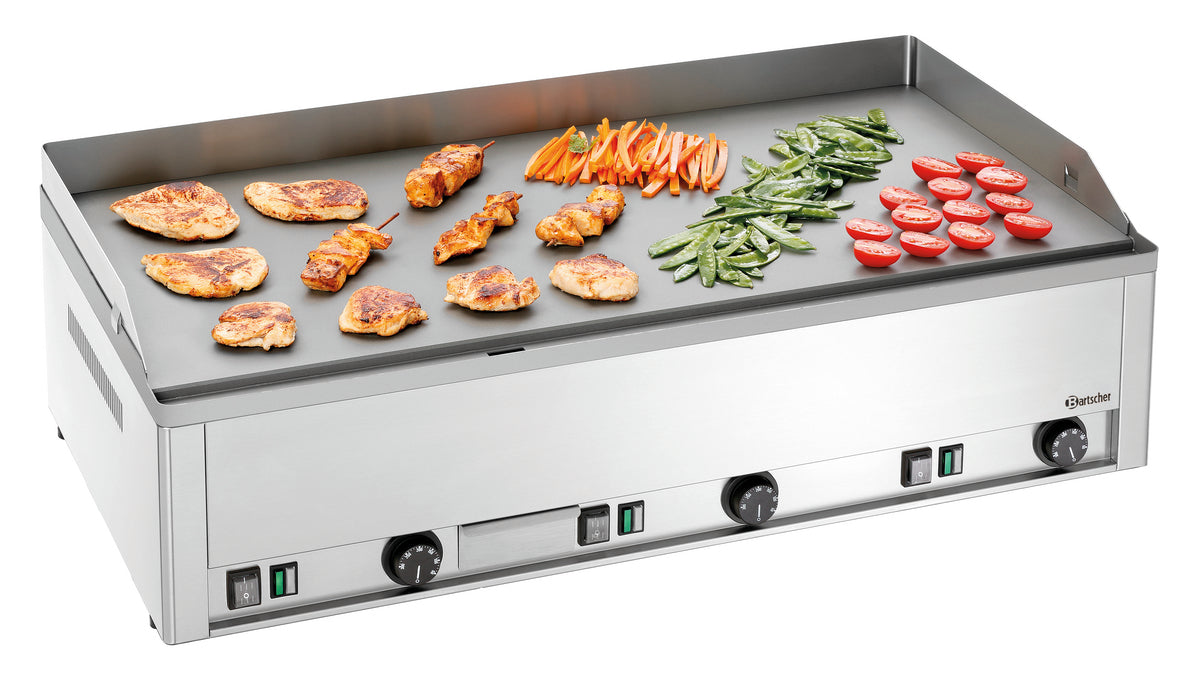 Grillplatte mit Gemüse und Fleisch.