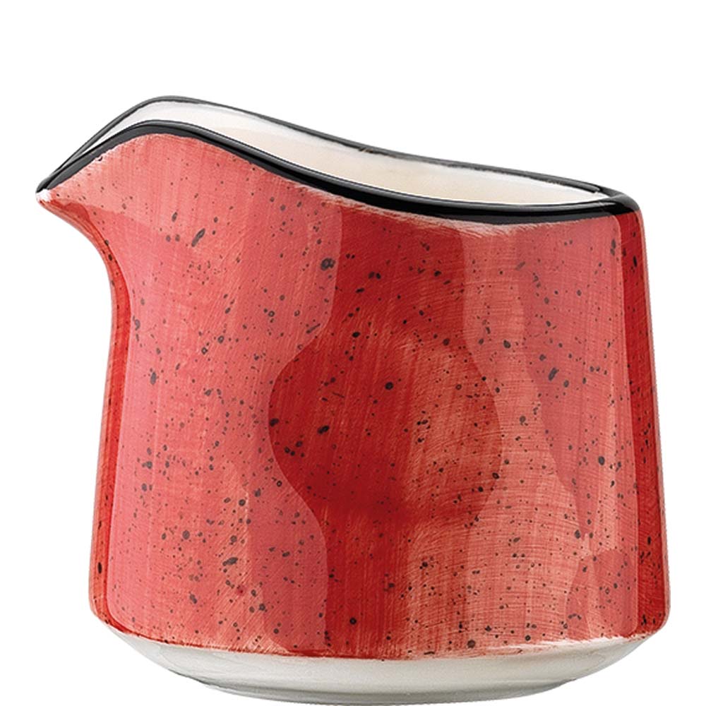 Roter Keramik-Milchkännchen mit Sprenkeln.
