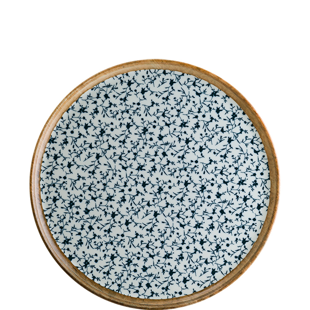 Runder Teller mit blauem Blumenmuster