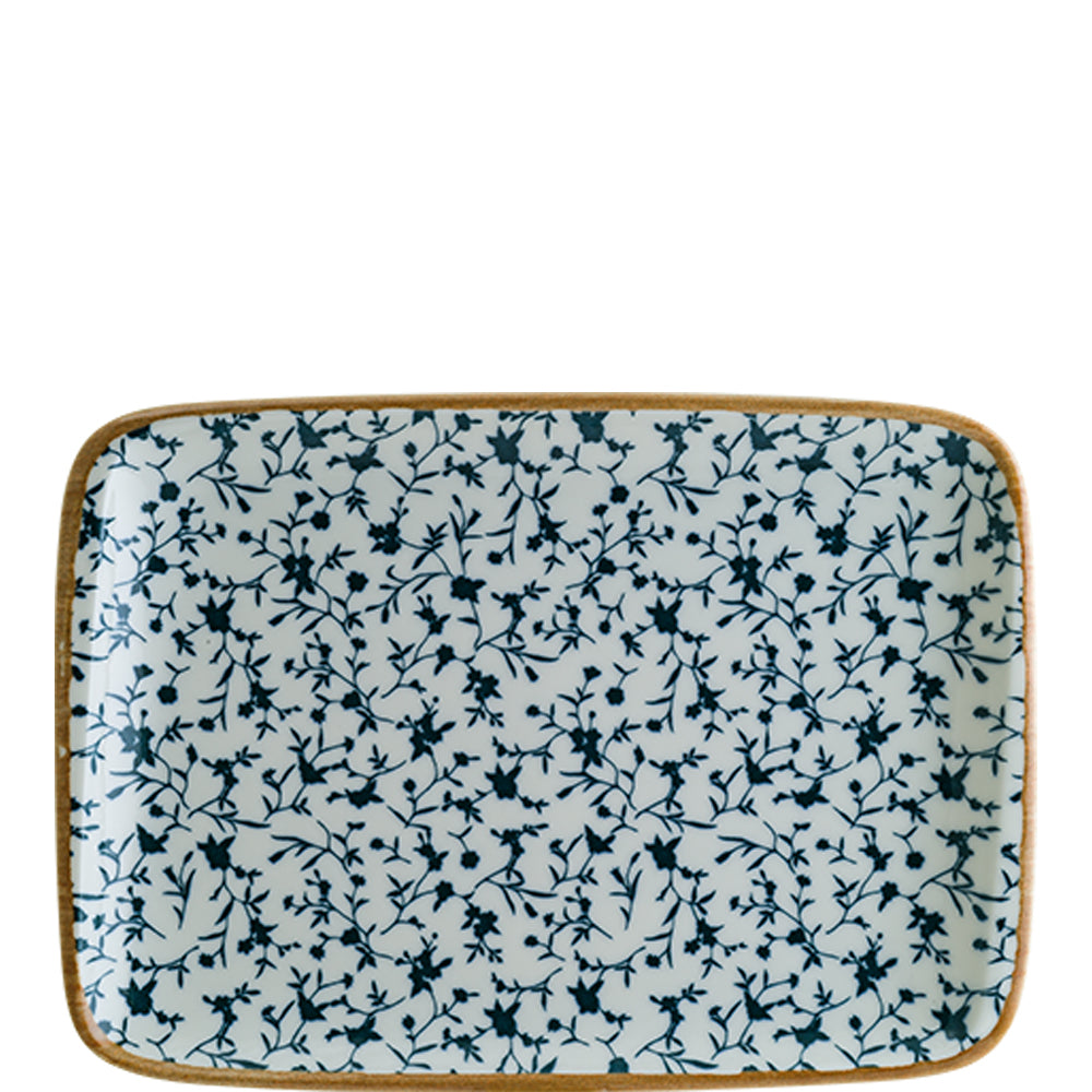 Rechteckiger Teller mit Blumenmuster.