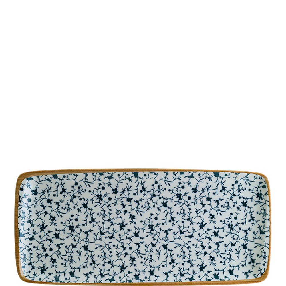 Rechteckiger Teller mit Blumenmuster.