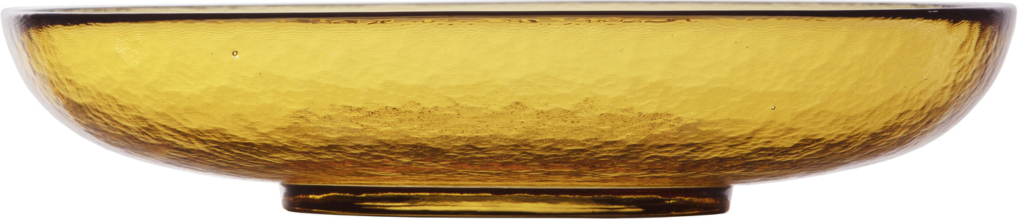 Gelbe Glasschale mit Struktur.