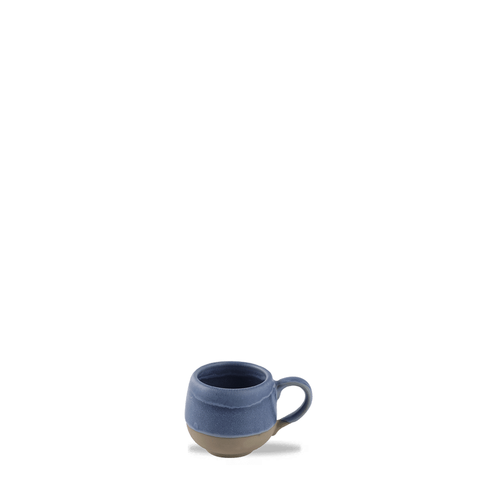 Blaue Kaffeetasse auf Tisch
