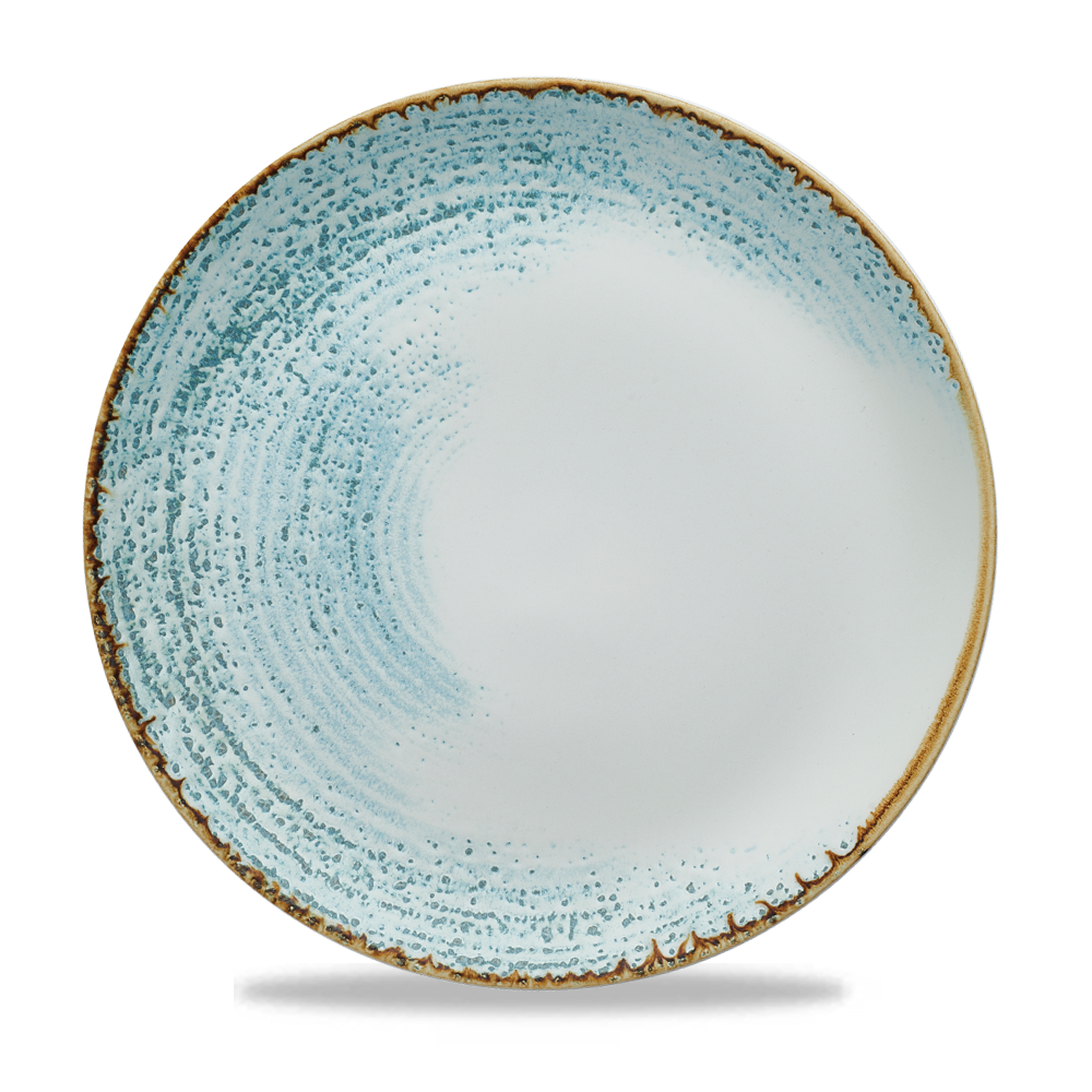 Blauer, rustikaler Teller mit Muster.