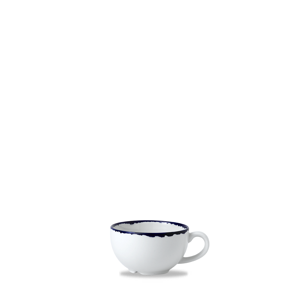 Weiße Tasse mit blauem Rand.