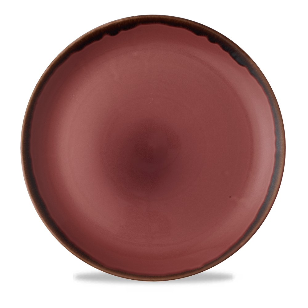 Roter Teller mit dunklem Rand.