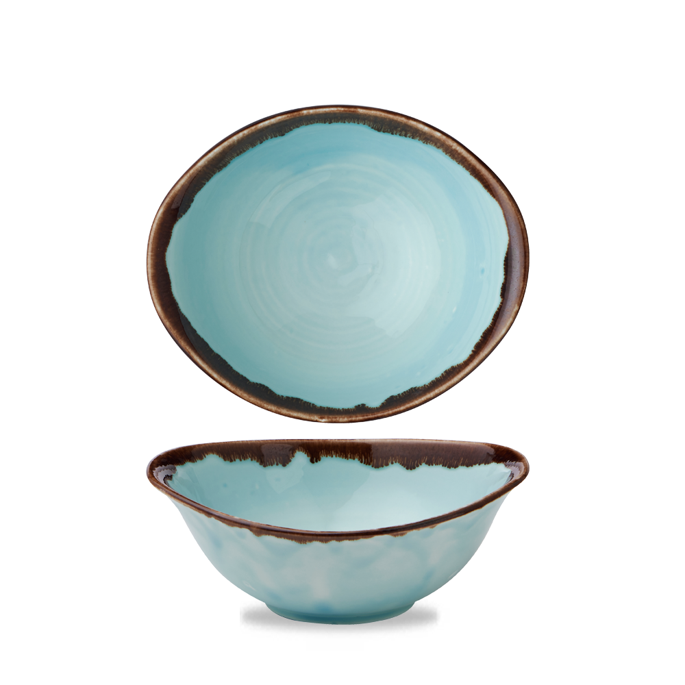 Zwei türkisfarbene Schalen, rustikales Design.