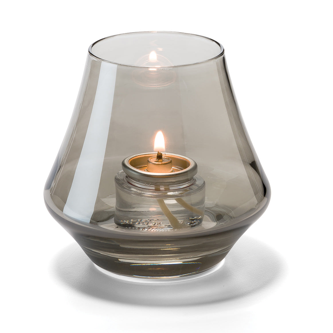 Glaswindlicht mit brennender Kerze.