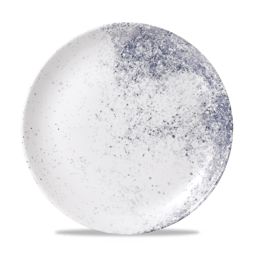 Weißer Teller mit blauen Sprenkeln.