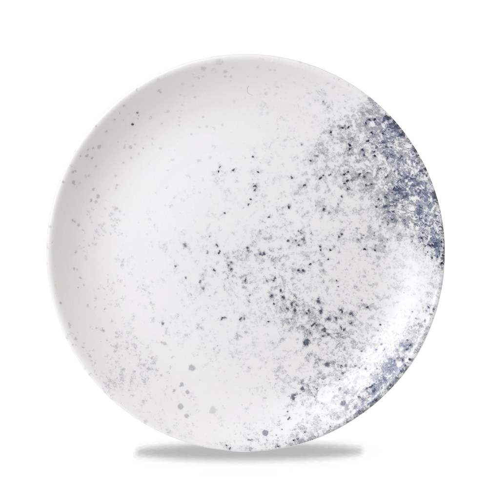 Weißer Teller mit blauen Sprenkeln.