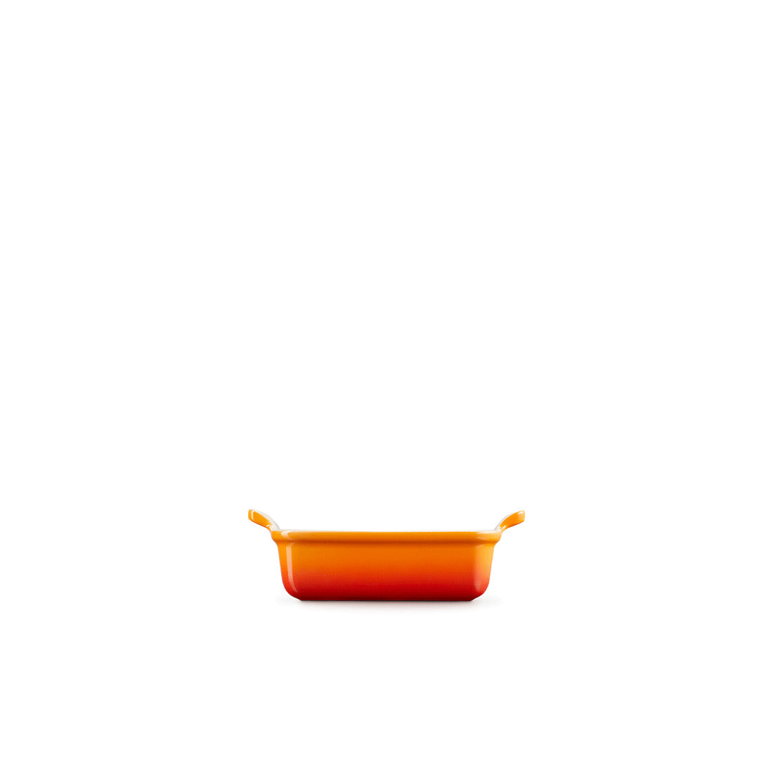 Kleine orange-weiße Auflaufform.