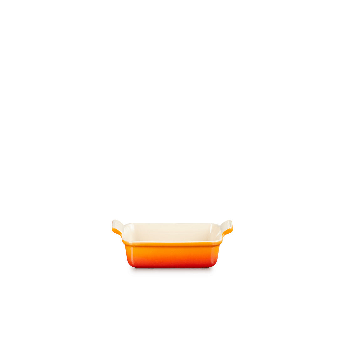 Kleine orange-weiße Auflaufform.