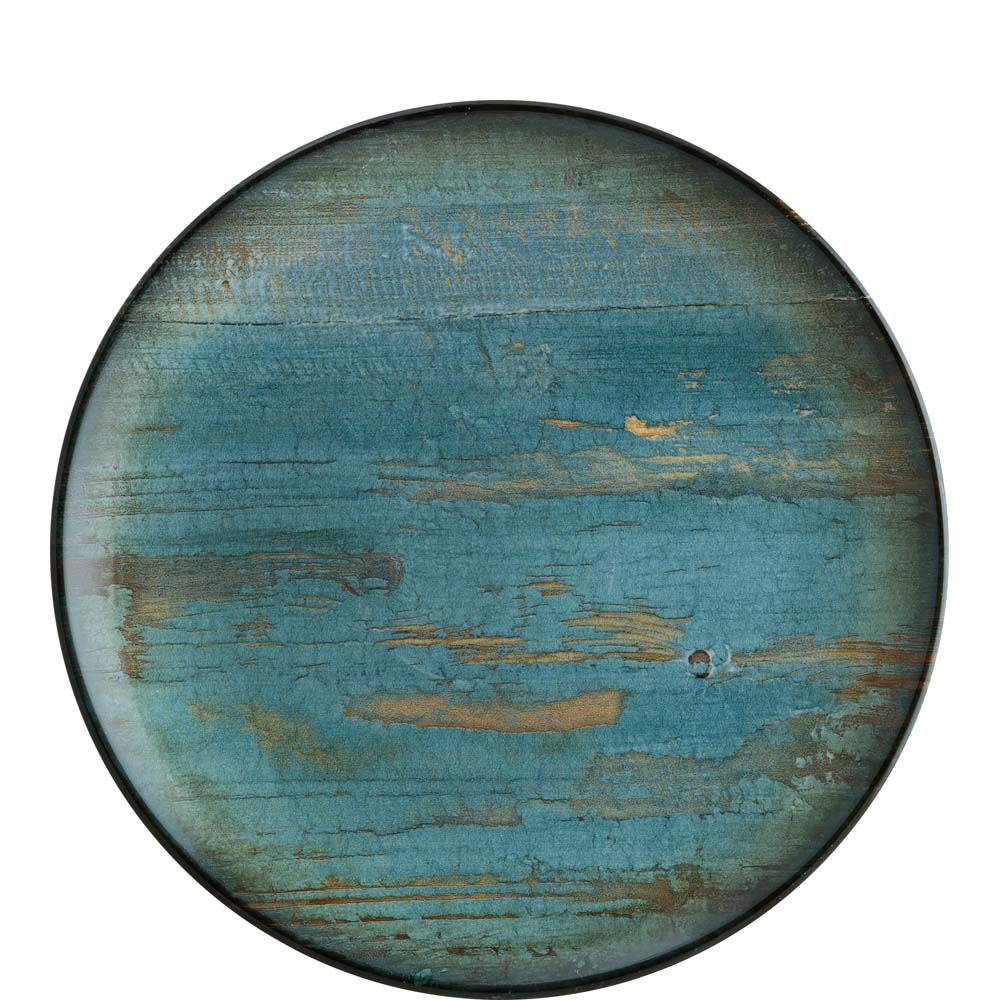 Runder, blauer, rustikaler Teller.