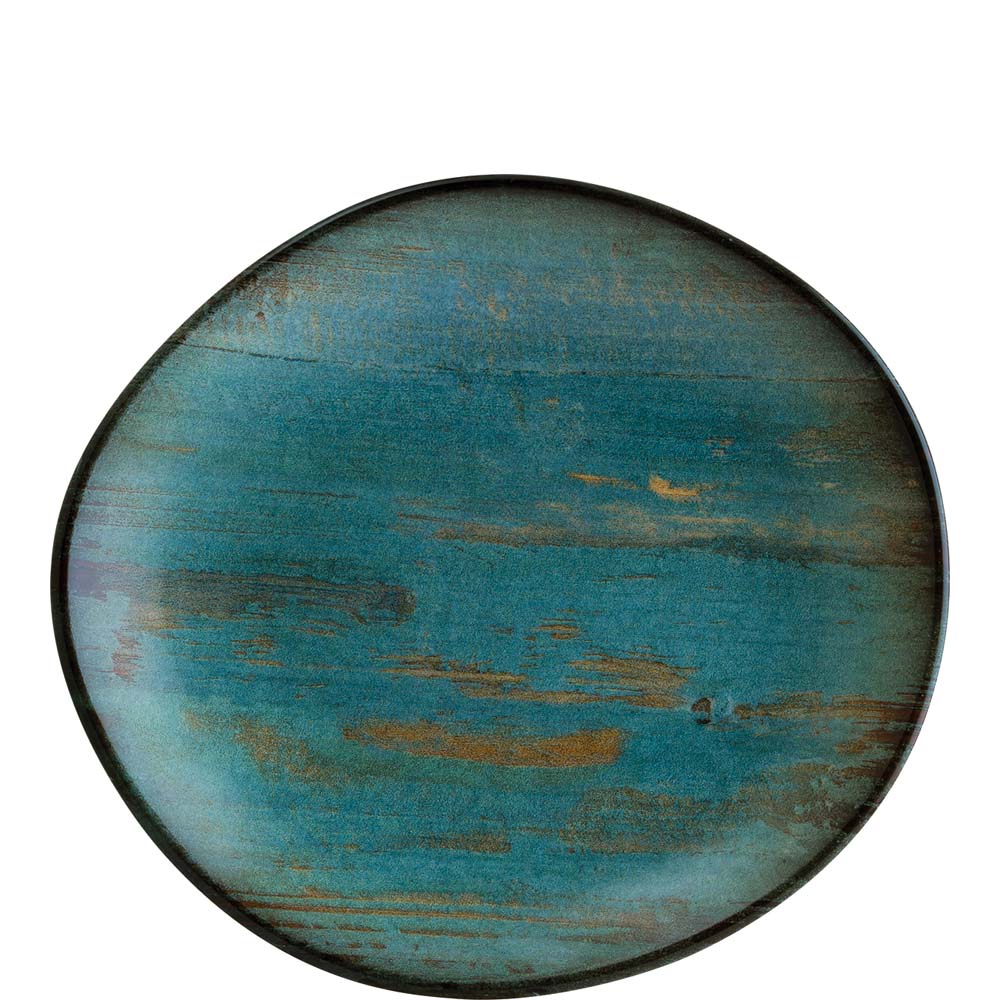 Unregelmäßiger, blauer, rustikaler Teller.