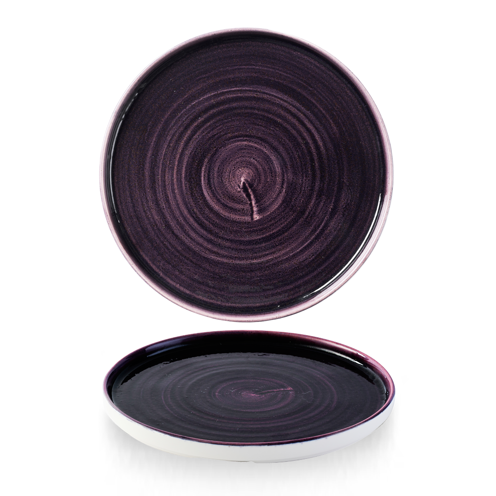 Zwei lila Teller mit Spiralmuster.