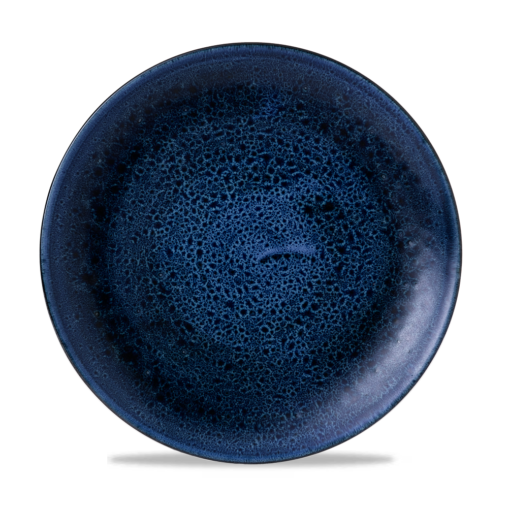 Blauer, strukturierter Teller von oben.