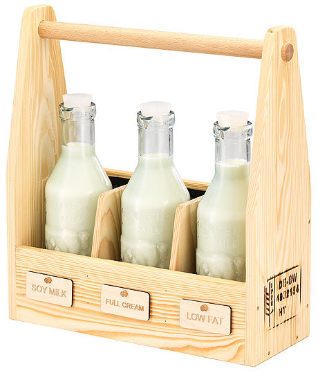 Milchflaschen in Holzträger.