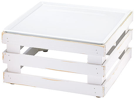 Weiße Holzpalette mit Glasplatte.