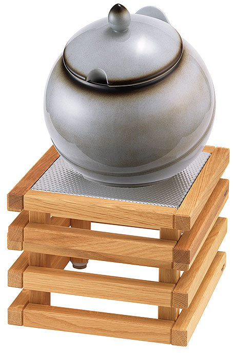 Keramiktopf auf Holzgestell.
