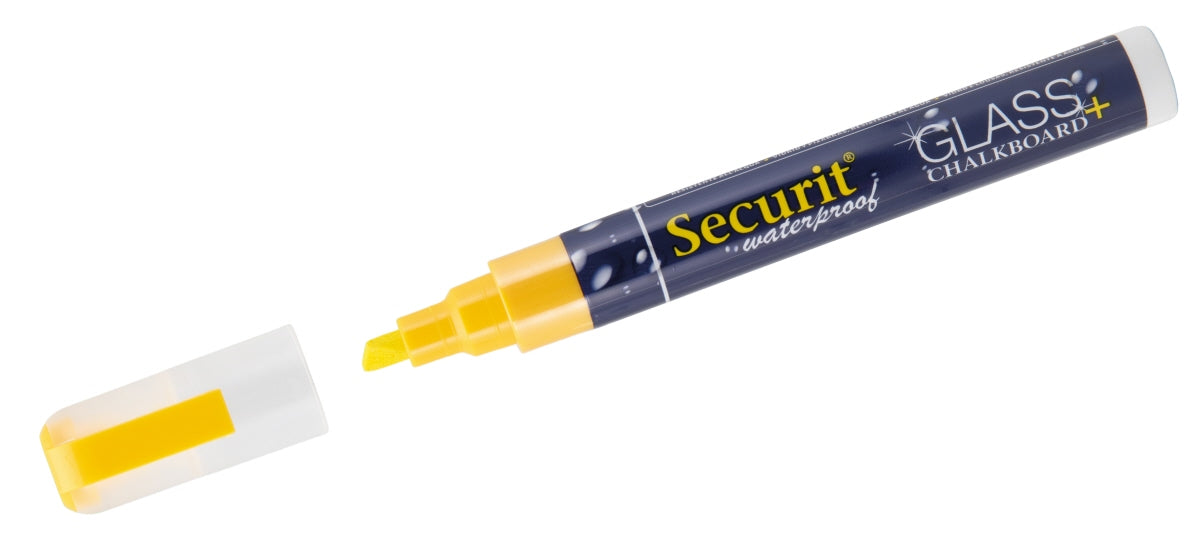Gelber Kreidemarker mit abgenommener Kappe.